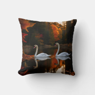 Graceful White Swans Gliding Across Autumn pond Throw Pillow