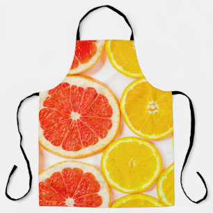 Gradient colour citrus slices on white backgrounda apron