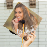 Graduate Photo Bold Script Personalized 2025 Graduation Cap Topper<br><div class="desc">Graduate is written in white handwritten script over your senior portrait photo makes a chic,  modern graduation cap topper. Customize this with a cute photograph of your senior.</div>