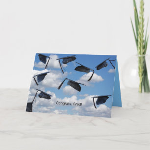 Graduation congratulations hats flying in sky card