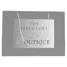 Élégante boutique logo feuille pour la marque mode