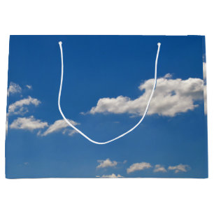 Grand Sac Cadeau Le ciel est bleu et des nuages blancs passent par