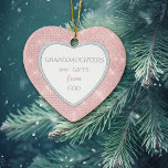Granddaughter Elegant Lights Pink Christmas Ceramic Ornament<br><div class="desc">This beautiful Christmas ornament is something that a granddaughter will always treasure. It features a shimmery pink, starry background, with a white centre heart that is framed in a faux diamond pattern. The text in silver grey and pink at the centre says "Granddaughters are Gifts from God". The back of...</div>