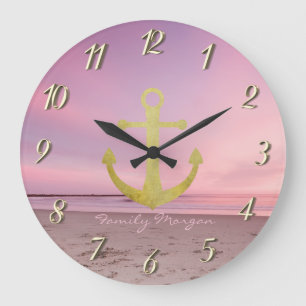 Grande Horloge Ronde Ancre dorée nautique sur coucher de soleil de plag