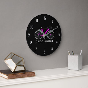 Grande Horloge Ronde Cycologiste vélo rose sur fond noir