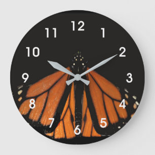 Grande Horloge Ronde Le papillon Monarque dans la clé d'Orange
