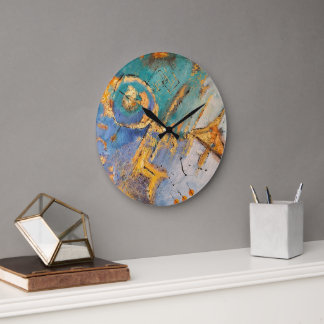 Grande Horloge Ronde reloj abstracto con tonos azules y oro