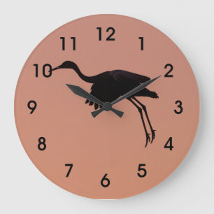 Grande Horloge Ronde Sandhill Silhouette sur le ciel rose coucher de so