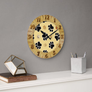 Grande Horloge Ronde Tan and black paw print on a gold background #3
