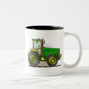 Grandes tasses vertes de tracteur