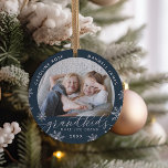 Grandkids Make Life Grand Photo Ceramic Ornament<br><div class="desc">Create a sweet gift for a beloved grandma or grandpa with this beautiful ceramic photo ornament. "Grandkids make life grand" appears along the bottom with white snowflake accents. Personalize with the year beneath,  and the grandchildren's names curving across the top. Add a second photo to the back.</div>