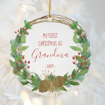 Grandma First Christmas Rustic Wreath Baby Photo Ceramic Ornament<br><div class="desc">This design features a rustic watercolor Christmas wreath decorated with pine cones, berries and candy canes, surrounding the words "My First Christmas as Grandma" and the year in whimsical red printing and handwriting fonts. Customize the reverse side with a favourite photo of the new grandchild, encircled by the same wreath....</div>
