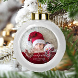 Grandparents First Christmas Photo White Script Ceramic Ball Christmas Ornament<br><div class="desc">Help them celebrate their first grandchild with this beautiful modern keepsake ornament. The white text reads "Our first Christmas as grandparents, " with the word "grandparents" in elegant handwriting script with flourishes before and after. Easily replace the sample image with your favourite photo of the new baby, and add his...</div>