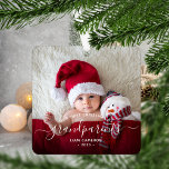 Grandparents First Christmas Photo White Script Metal Ornament<br><div class="desc">Help them celebrate their first grandchild with this beautiful modern keepsake ornament. The off-black text reads "Our first Christmas as grandparents, " with the word "grandparents" in elegant handwriting script with flourishes before and after. Easily replace the sample image with your favourite photo of the new baby, and add his...</div>