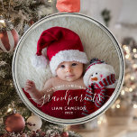 Grandparents First Christmas Photo White Script Metal Ornament<br><div class="desc">Help them celebrate their first grandchild with this beautiful modern keepsake ornament. The white text reads "Our first Christmas as grandparents, " with the word "grandparents" in elegant handwriting script with flourishes before and after. Easily replace the sample image with your favourite photo of the new baby, and add his...</div>