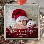 Grandparents First Christmas Photo White Script Metal Ornament<br><div class="desc">Help them celebrate their first grandchild with this beautiful modern keepsake ornament. The off-black text reads "Our first Christmas as grandparents, " with the word "grandparents" in elegant handwriting script with flourishes before and after. Easily replace the sample image with your favourite photo of the new baby, and add his...</div>