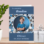 Grandson Birthday Blue Trendy Modern Photo Card<br><div class="desc">This birthday card can be personalized with your grandson's name, and a favourite photo. Your chosen photograph will appear in a round white 'frame' within a fun abstract pattern in a modern style. The text at the top of the card is 'To a wonderful Grandson', with his name below the...</div>