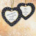 Grandson Gold Star Heart Keepsake Ceramic Ornament<br><div class="desc">This is a wonderful Christmas ornament for a grandparent to give to a grandson. It features a white heart shape framed in shiny gold, and set against a gold star studded dark blue background. In the centre is your customized text in dark blue. Currently, the text says "Grandsons are the...</div>