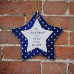 Grandson Star Pattern Keepsake Ceramic Ornament<br><div class="desc">This is a wonderful Christmas ornament for a grandparent to give to a grandson. It features a silver star shape set against a star studded blue background. In the centre is your customized text in dark blue. Currently, the text says "My grandson is the star in my heart". The text...</div>