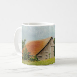 Grange à toits rouges dans la Mug de pré