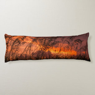 Grass silhouettes at sunset body pillow