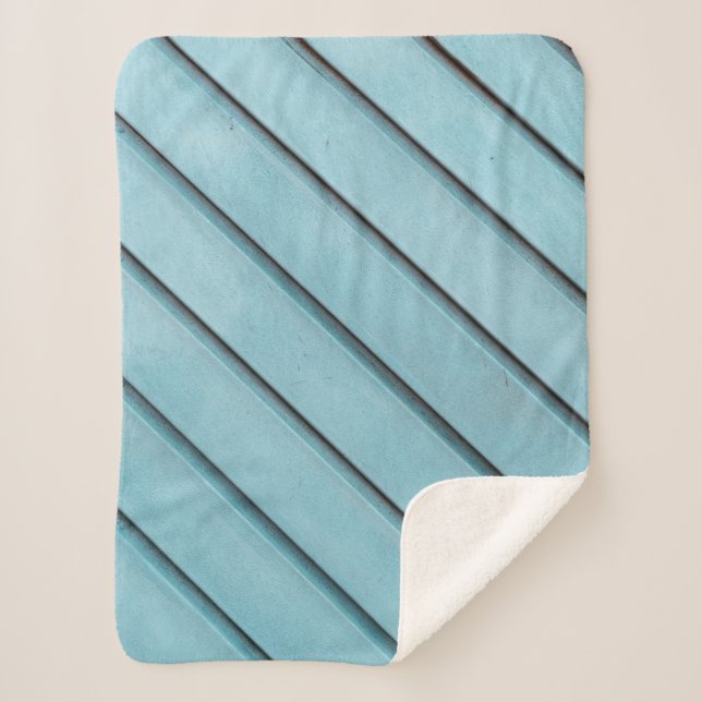 Gray and black metal frame sherpa blanket (Front)