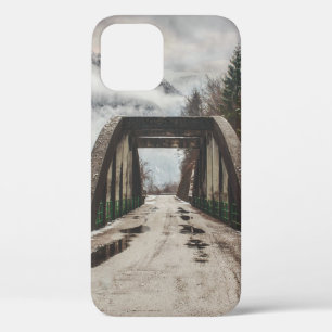 GRAY CONCRETE ARCH BRIDE BESIDE LEAFLESS TREE NEAR iPhone 12 CASE