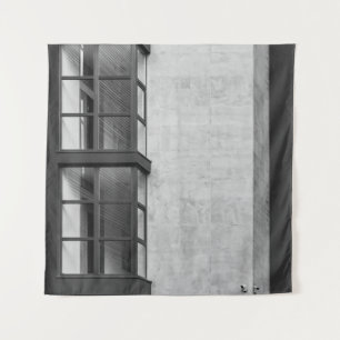 GRAY CONCRETE BUILDING WITH GLASS WINDOW TAPESTRY