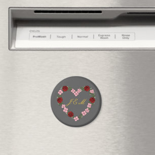 Gray magnet with a pink and red heart
