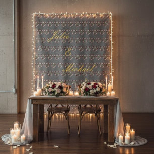 Gray wall hanging with pink heart patterns and tapestry