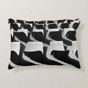 Grayscale photography of chairs with no people accent pillow