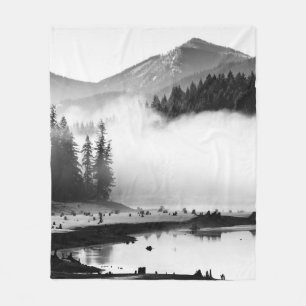 GRAYSCALE PHOTOGRAPHY OF LAKE NEAR PINE TREES FLEECE BLANKET