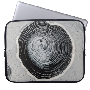 Grayscale photography of mud laptop sleeve