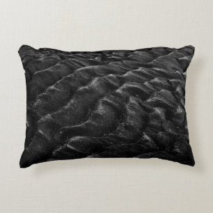 Grayscale photography of sand accent pillow
