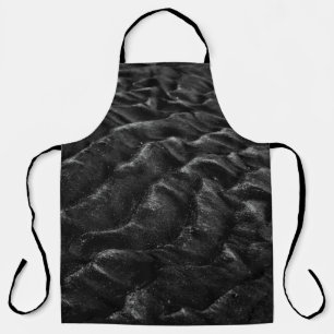 Grayscale photography of sand apron