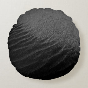 Grayscale photography of sand round pillow