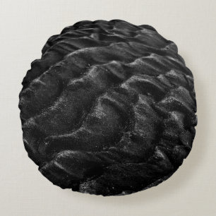 Grayscale photography of sand round pillow
