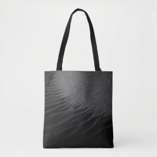 Grayscale photography of sand tote bag