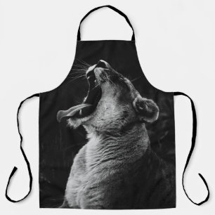 GRAYSCALE PHOTOGRAPHY OF YAWNING LIONESS APRON