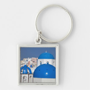 Greece, Santorini. Bell tower and blue domes of Keychain