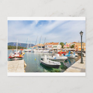 Greek harbour with sailing boats in Fiskardo Postcard