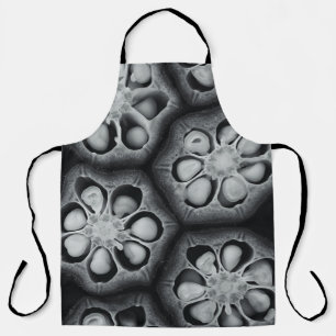 Green and black plant illustration apron
