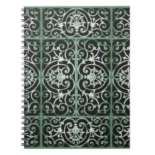 Green and black scrollwork pattern notebook