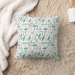 Green and blue botanical pattern on white throw pillow