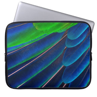 Green and blue feather close-up photography laptop sleeve