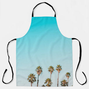 GREEN-AND-BROWN PALM TREES UNDER CLEAR BLUE SKY APRON