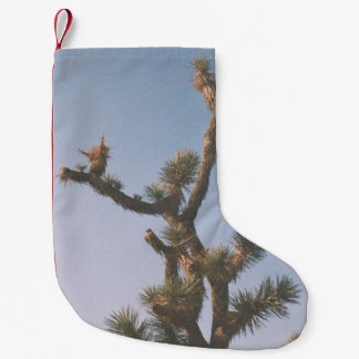 GREEN AND BROWN TREE UNDER BLUE SKY SMALL CHRISTMAS STOCKING