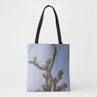 GREEN AND BROWN TREE UNDER BLUE SKY TOTE BAG