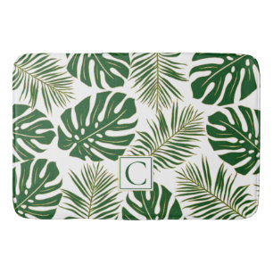 Green and gold tropical leaves and monogram bath mat