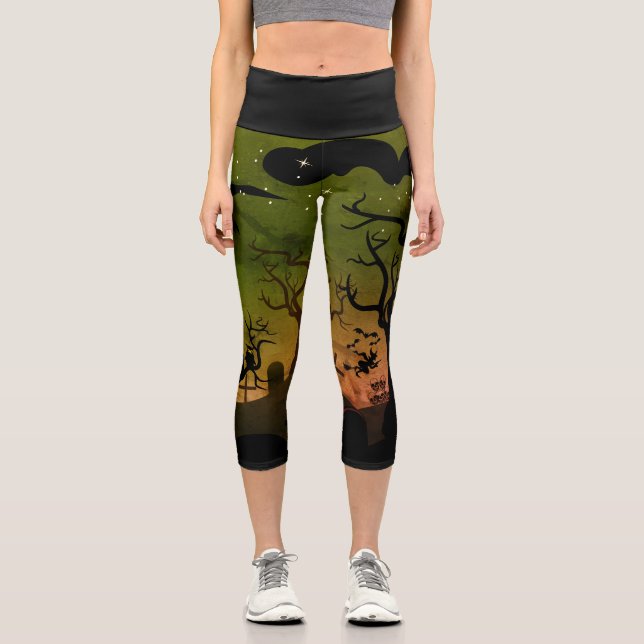 Green and orange haunted graveyard scene Halloween Capri Leggings (Front)